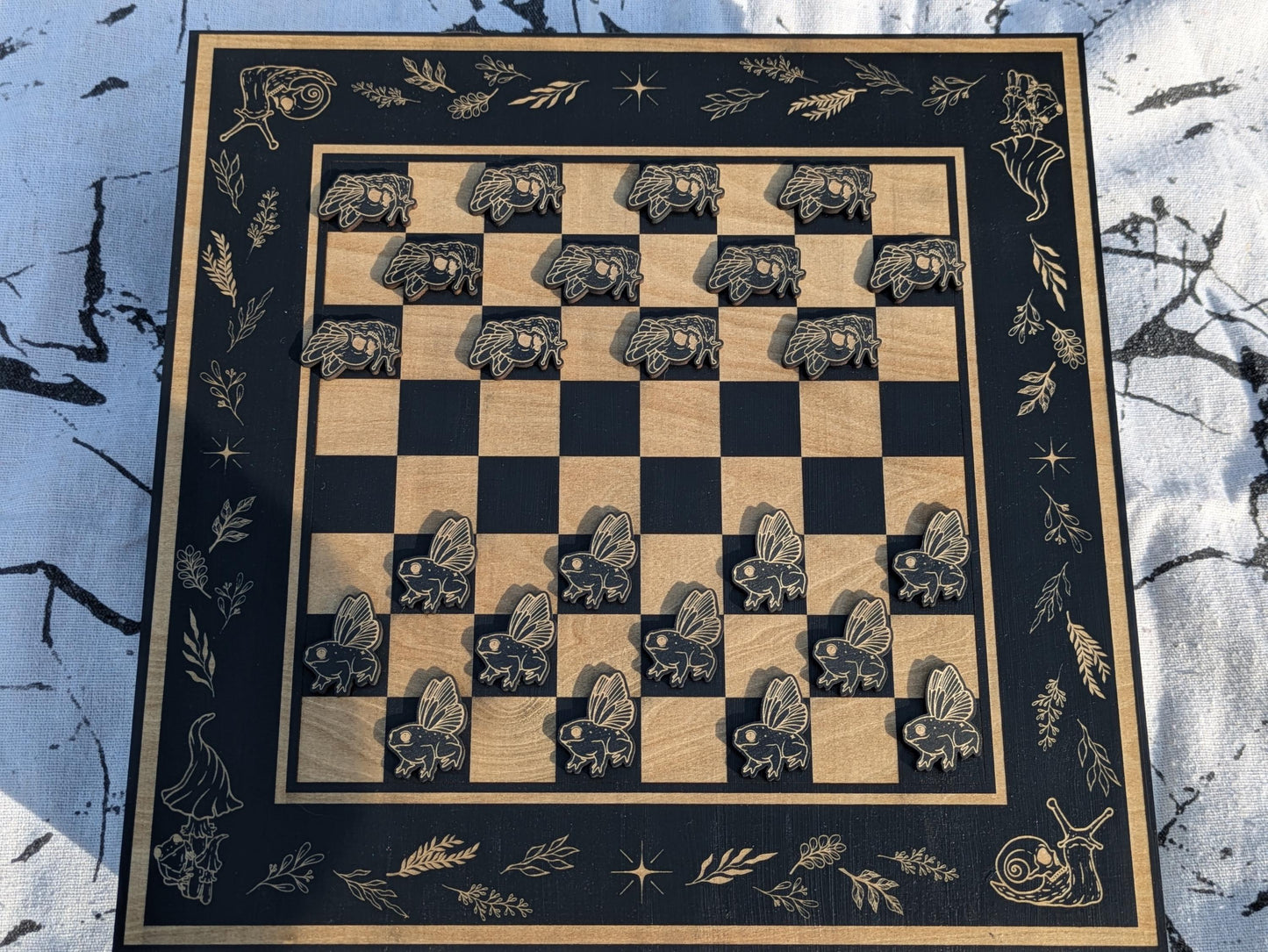 Whimsical Wood Checkerboard Game Box - Handcrafted with Engraved Nature Art, Snail & Frog Playing Pieces